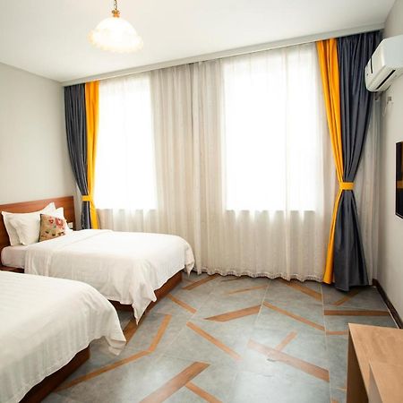 Ou Lu Business Hotel Qingdao Exterior foto
